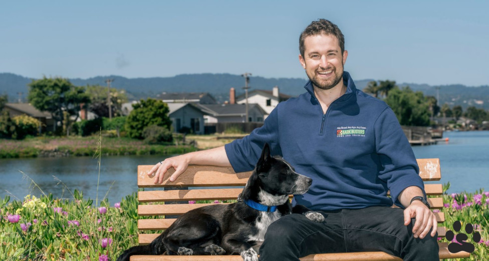 Dog trainer in San Mateo County outside with his dog