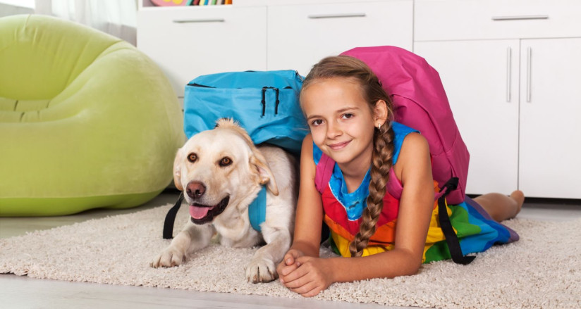 Girl and Dog off to School