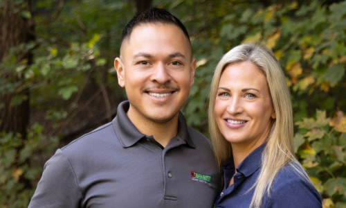 Dog trainers Omar and Ryanne in Dakota County