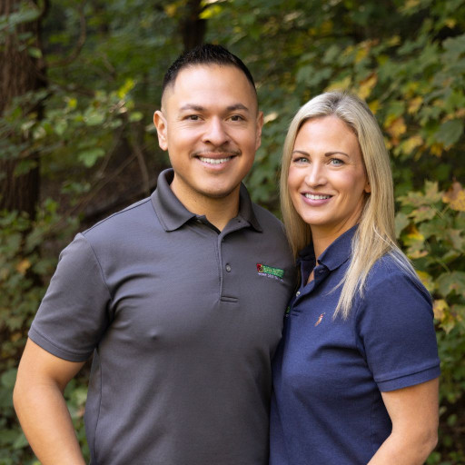 Dog trainers Omar and Ryanne in Dakota County